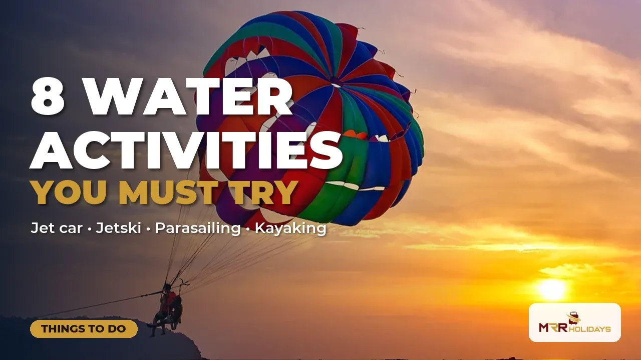 Parasailing di atas laut ketika matahari terbenam di Langkawi